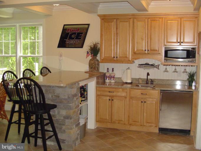 12224 Jerusalem Road Kingsville, MD 21087 - Photo 22 of 30 Lower level kitchen & entertaining area