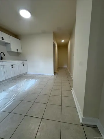 a view of a kitchen with kitchen and window