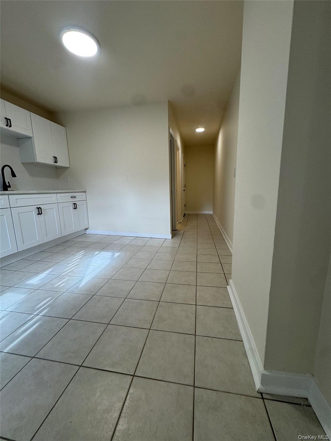 a view of a kitchen with kitchen and window