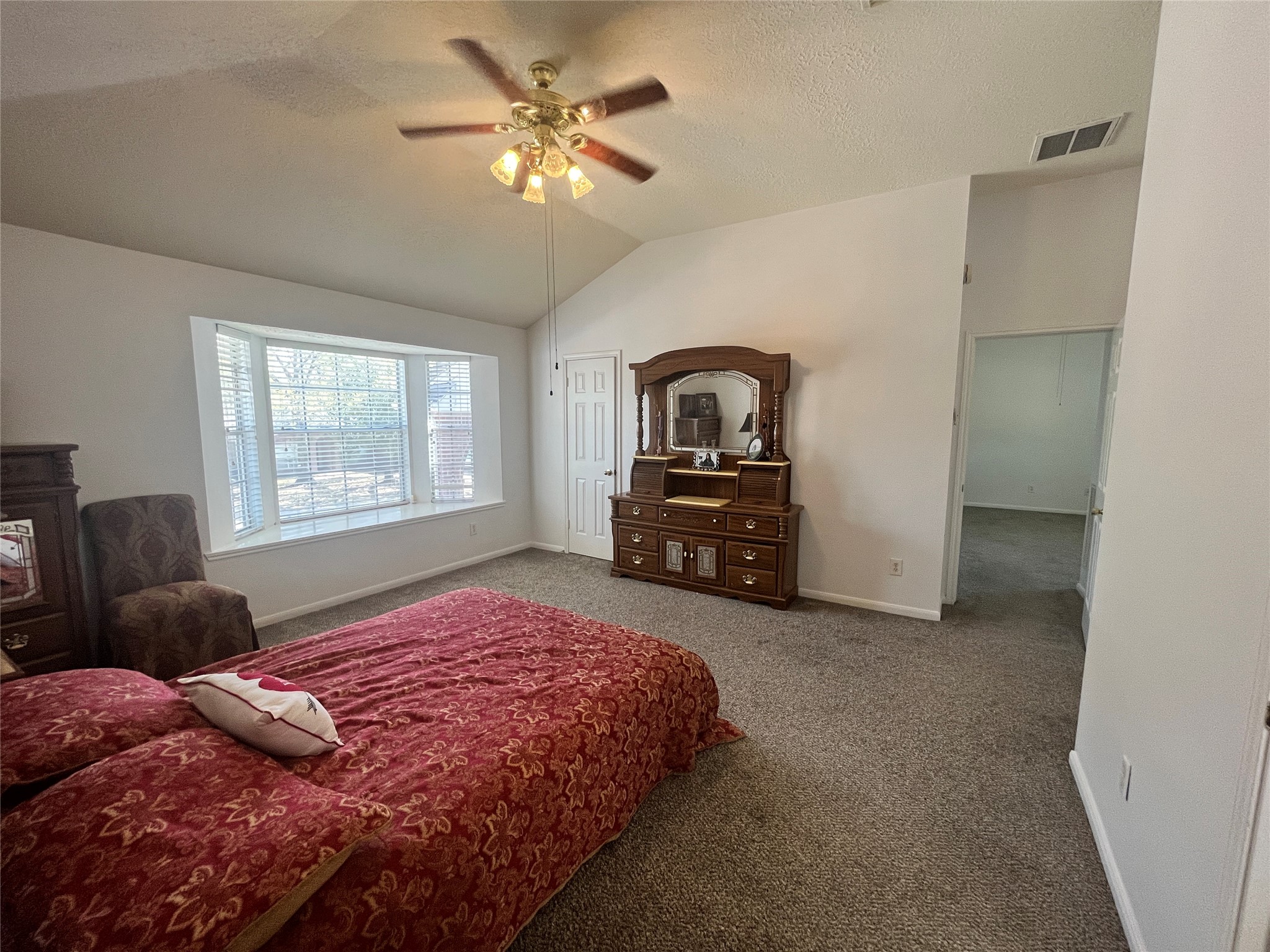 28723 Sedgefield Street Spring, TX 77386 - Photo 30 of 33 a bedroom with a bed and dresser