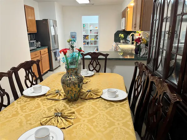 a view of a dining room with furniture