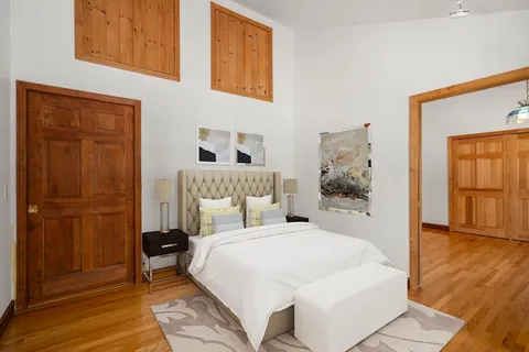 a bathroom with a granite countertop sink a toilet and a bathtub