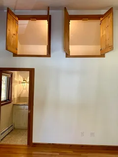 a view of a livingroom with furniture and window