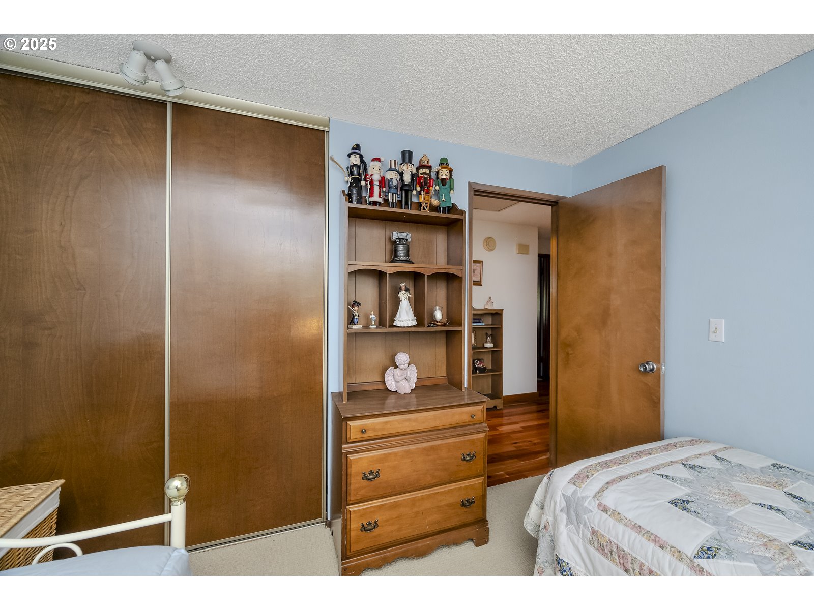 490 Southwest Nancy Avenue Gresham, OR 97030 - Photo 26 of 37 a bedroom with a bed and a cabinets