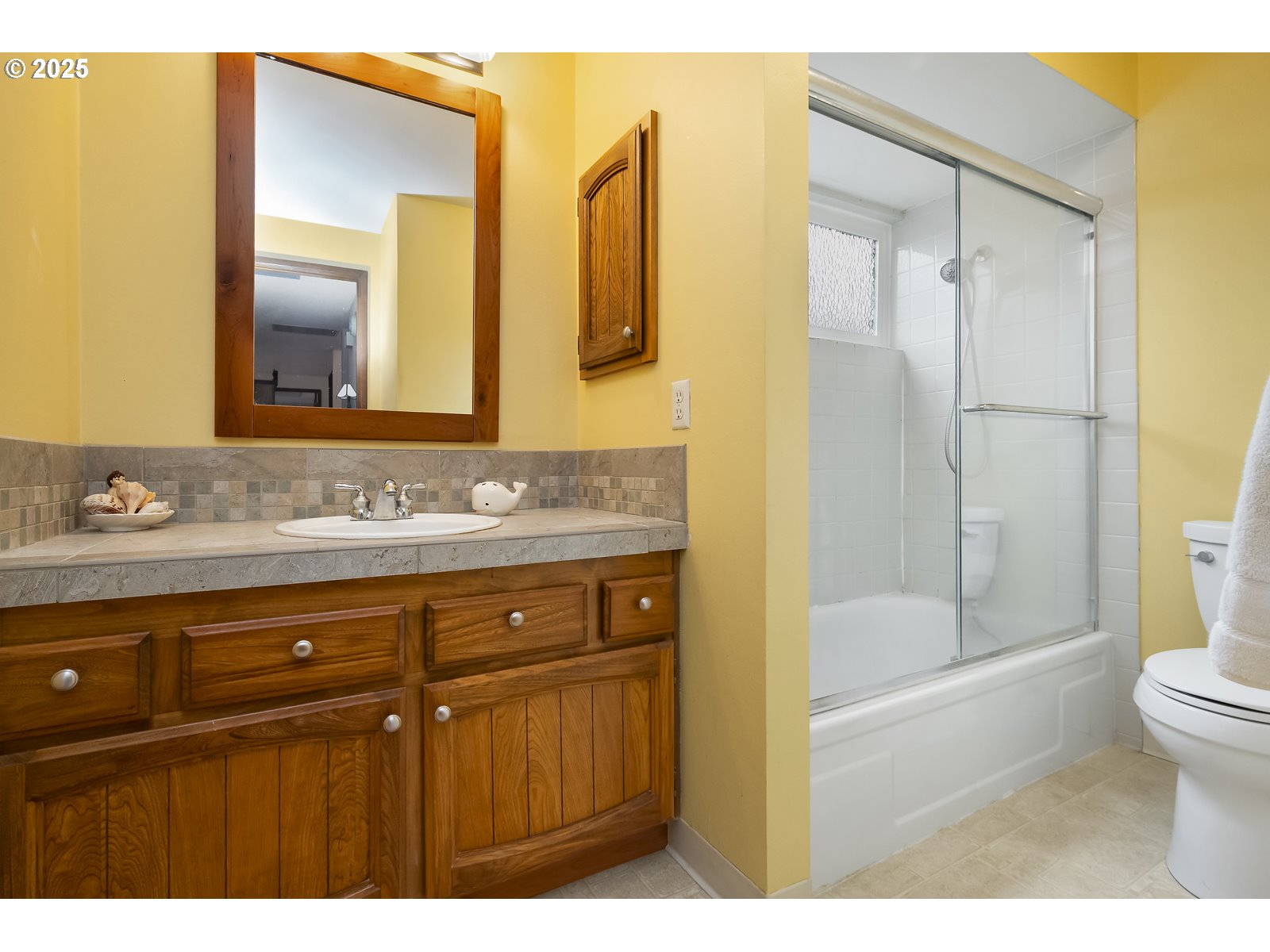 490 Southwest Nancy Avenue Gresham, OR 97030 - Photo 29 of 37 a bathroom with a sink and a mirror