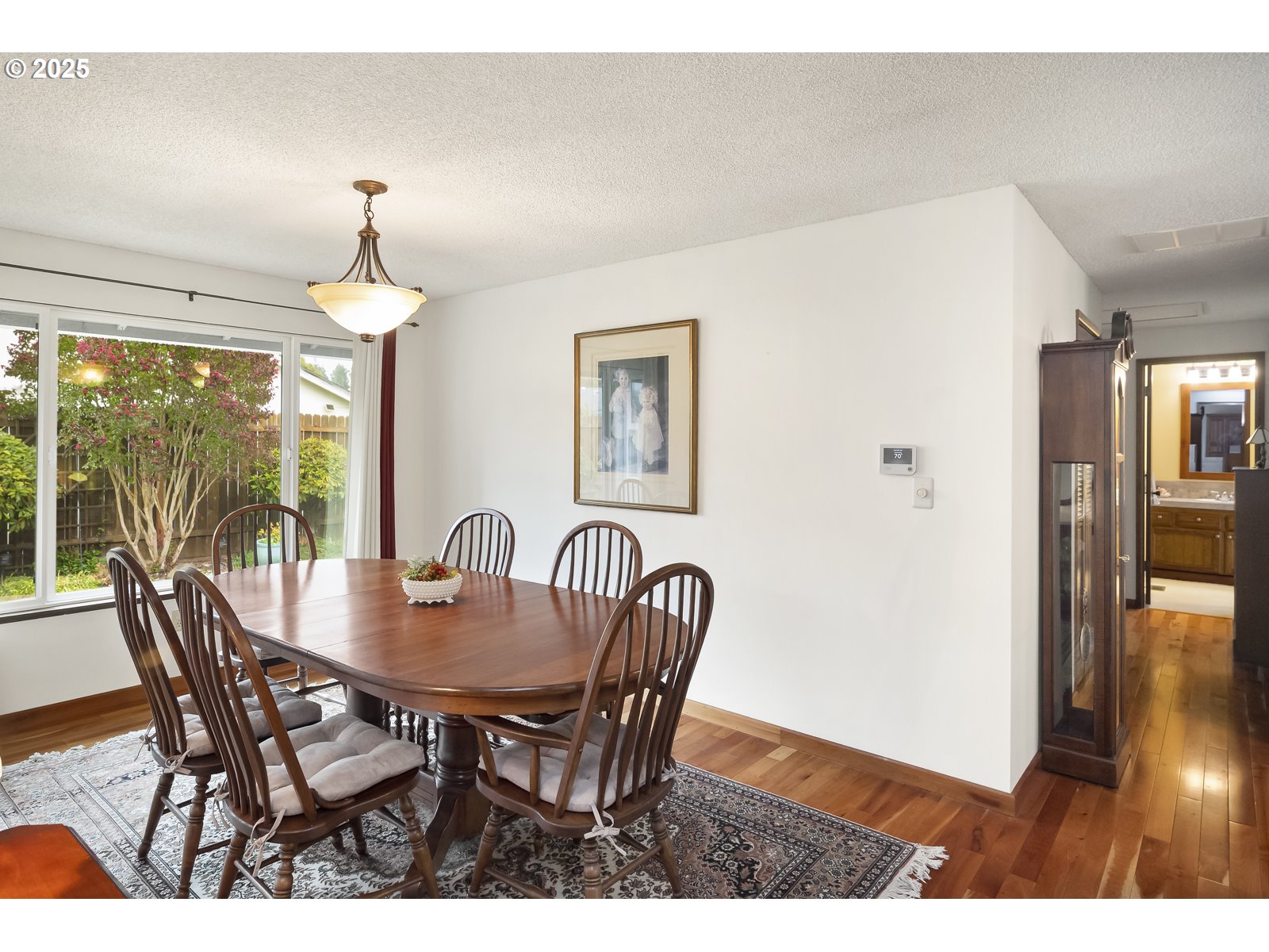 490 Southwest Nancy Avenue Gresham, OR 97030 - Photo 8 of 37 a view of a dining room with furniture window and wooden floor