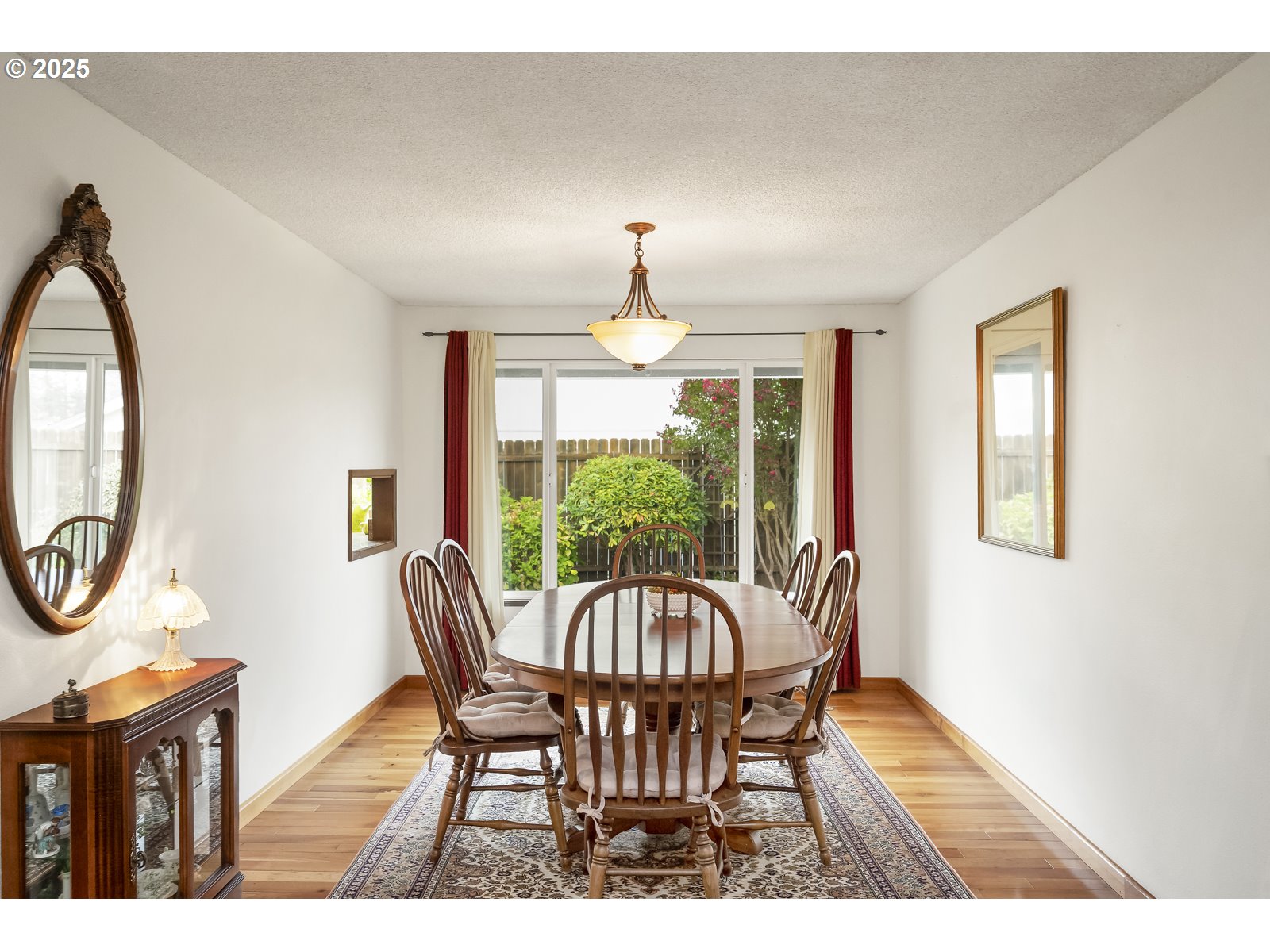 490 Southwest Nancy Avenue Gresham, OR 97030 - Photo 9 of 37 a view of a dining room with furniture window and wooden floor