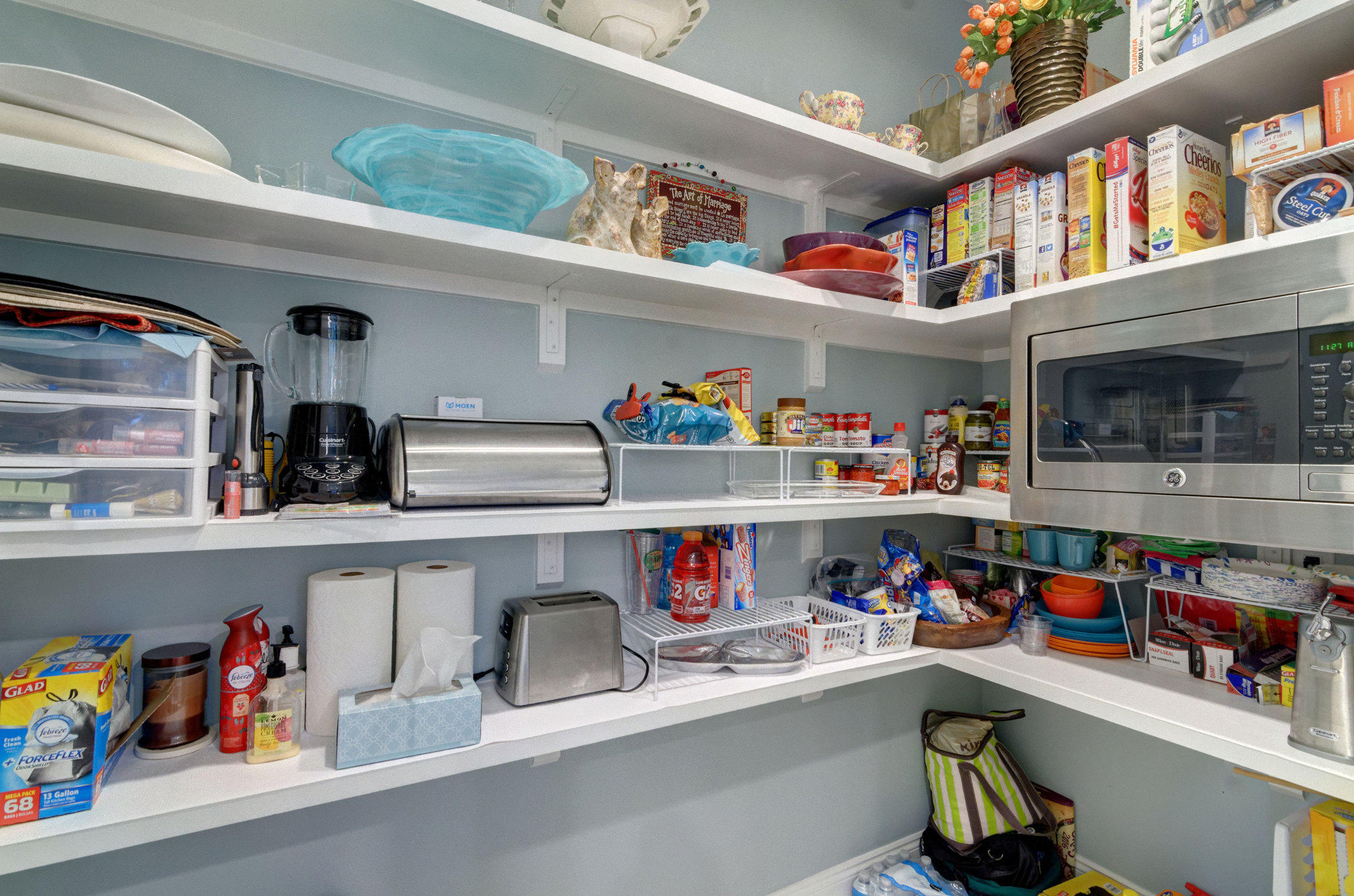 1922 Baytowne Loop Miramar Beach, FL 32550 - Photo 20 of 65 a utility room with lots of clutter and cabinets