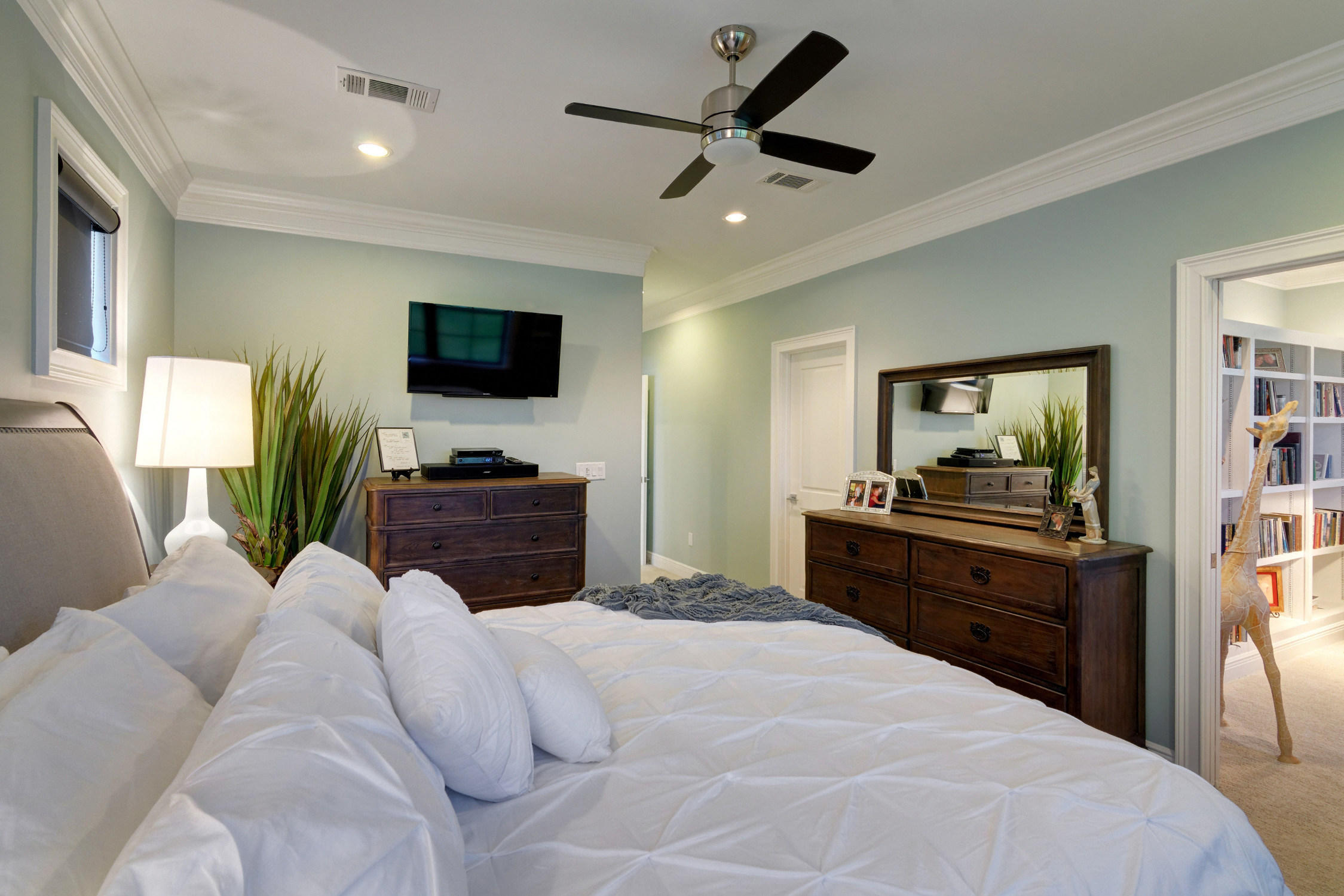 1922 Baytowne Loop Miramar Beach, FL 32550 - Photo 36 of 65 a bedroom with a bed and a flat screen tv