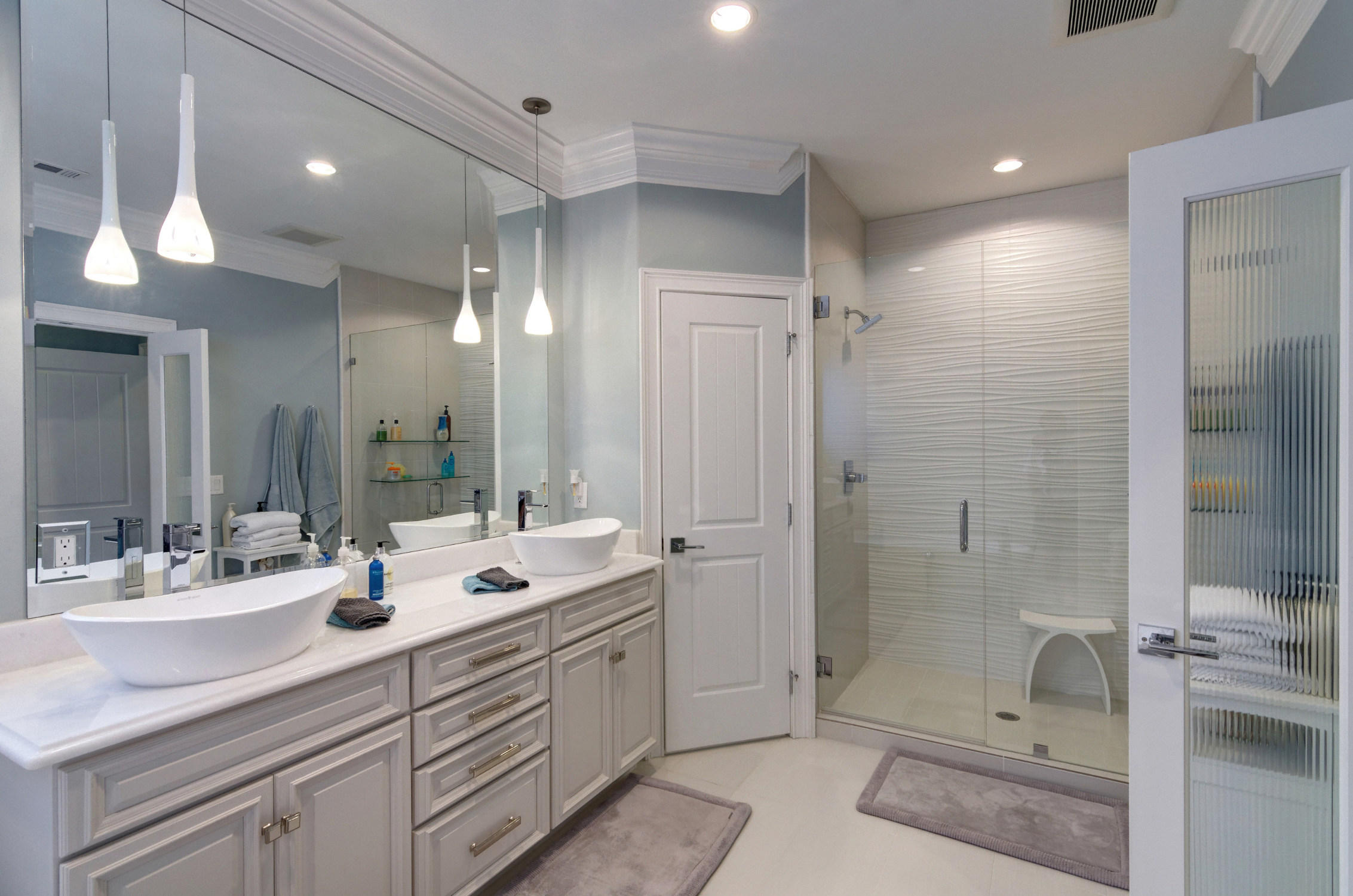 1922 Baytowne Loop Miramar Beach, FL 32550 - Photo 44 of 65 a bathroom with a double vanity sink mirror and shower