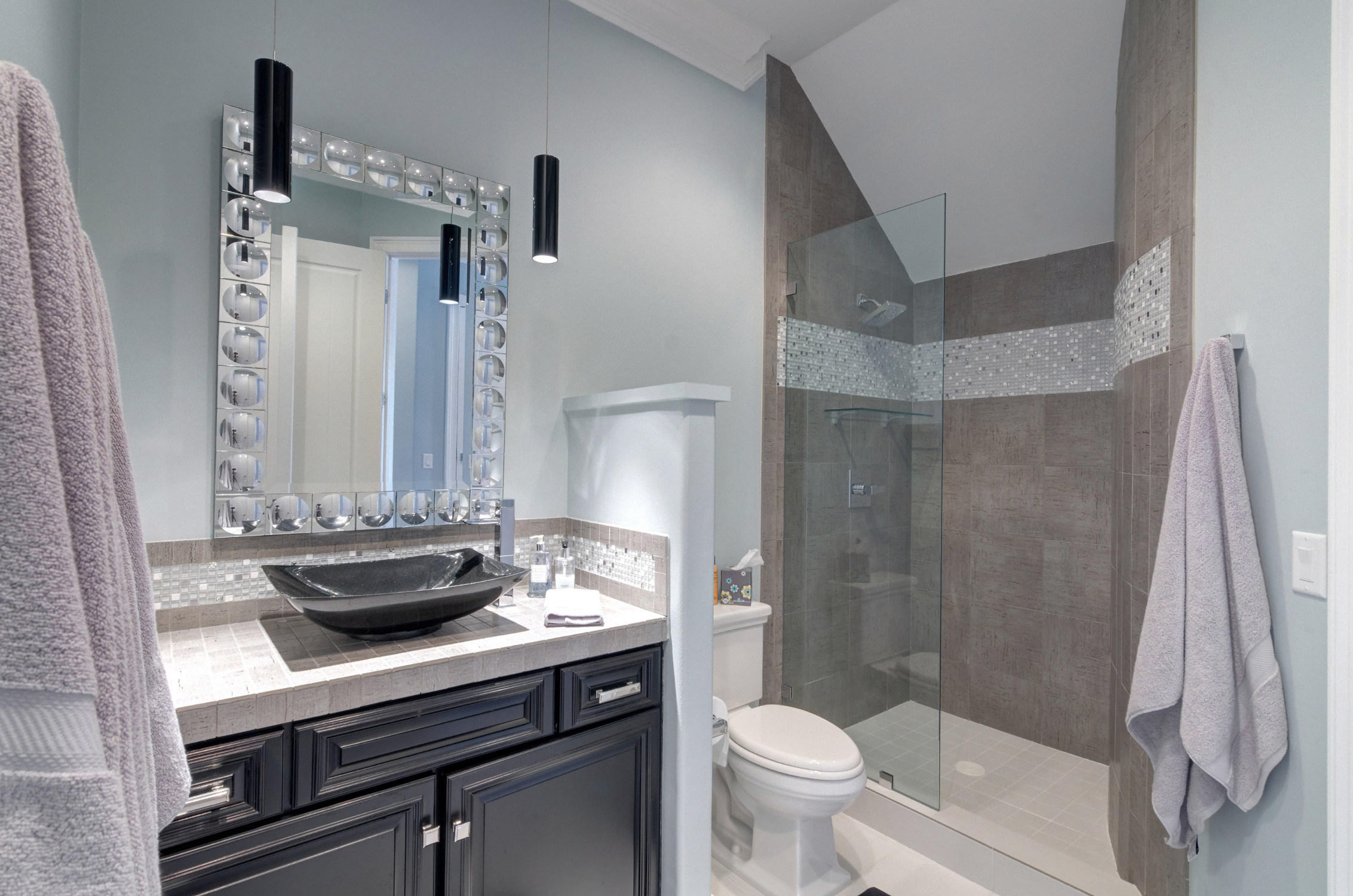 1922 Baytowne Loop Miramar Beach, FL 32550 - Photo 10 of 65 a bathroom with a sink a toilet and shower