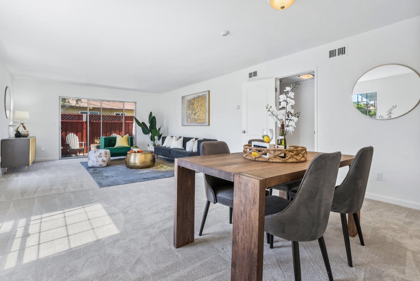 1915 Mt Vernon Court, Unit 10 Mountain View, CA 94040 - Photo 1 of 19 a view of a dining room with a table and chairs