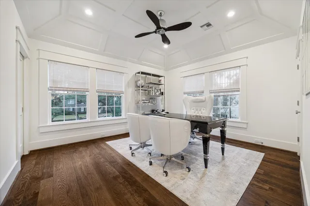 a living room with furniture a window and a table