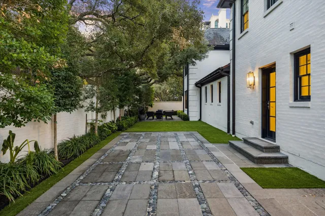 a view of a pathway with a yard