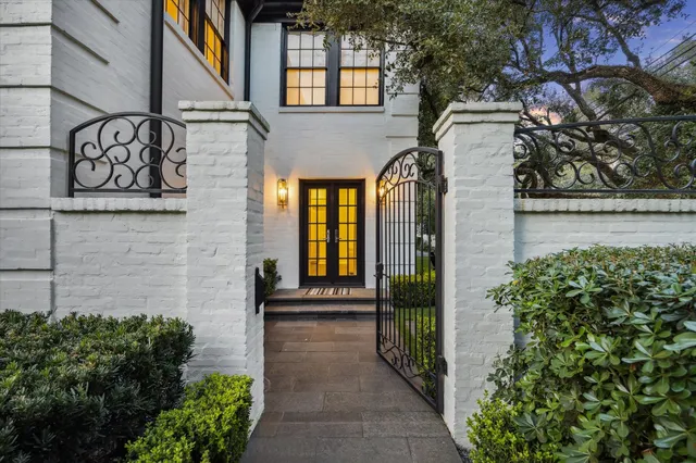 a view of entrance gate of a house