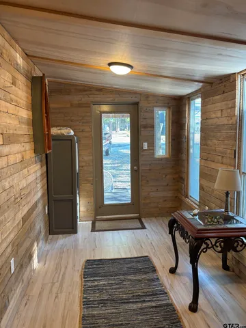 a view of a lounge chairs in the porch