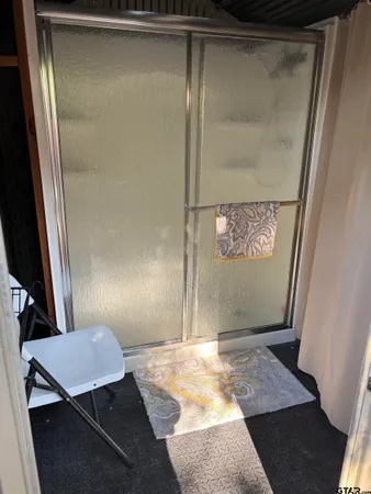 a view of a backyard with a trees