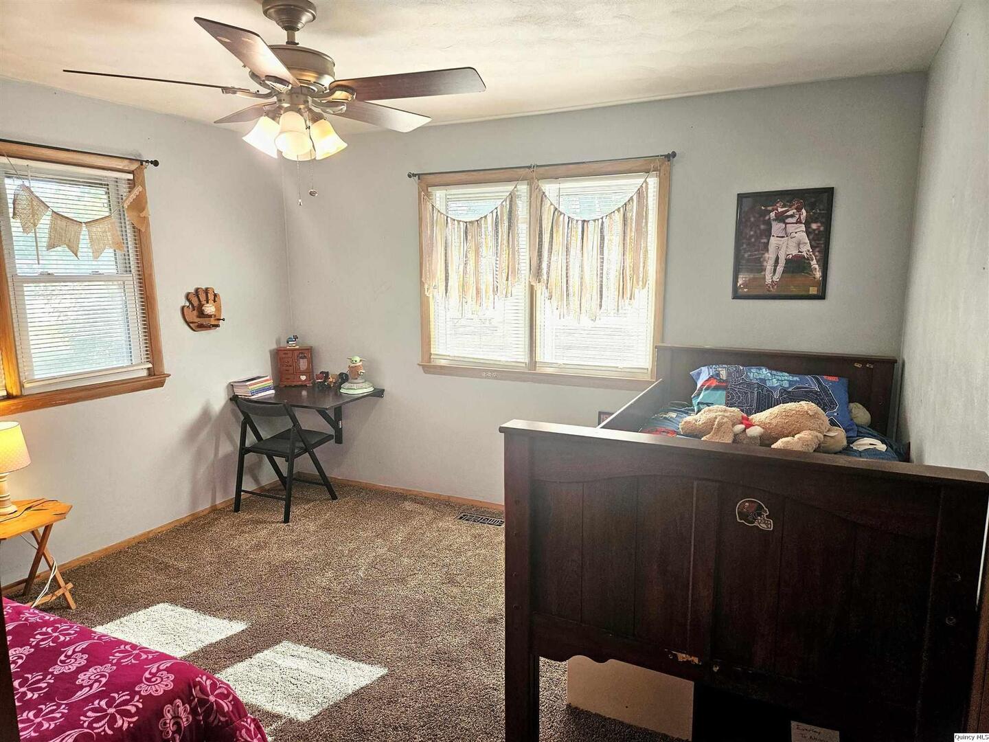 803 Maas Road Quincy, IL 62305 - Photo 14 of 28 a workspace with furniture and window