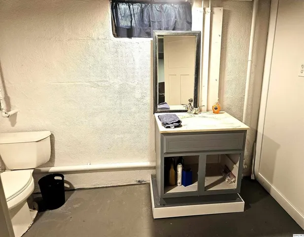 a bathroom with a sink and a toilet