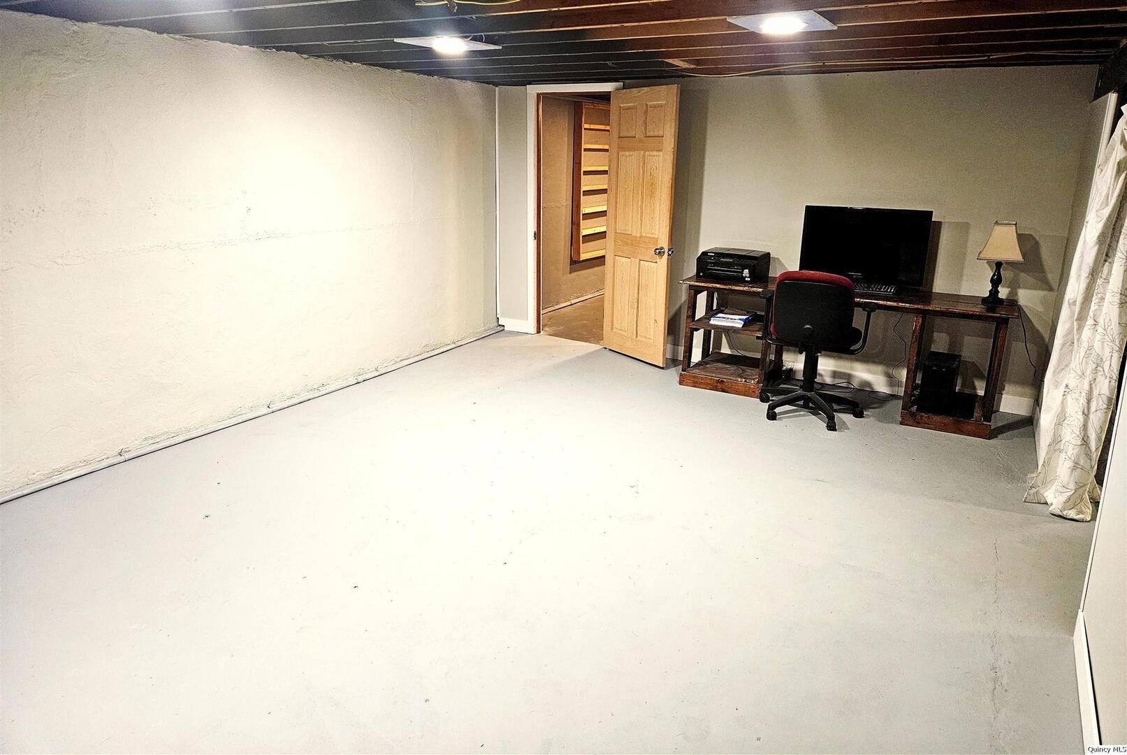 803 Maas Road Quincy, IL 62305 - Photo 19 of 28 a view of a workspace with furniture