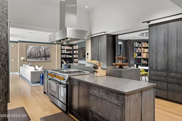 a kitchen with a stove and a refrigerator