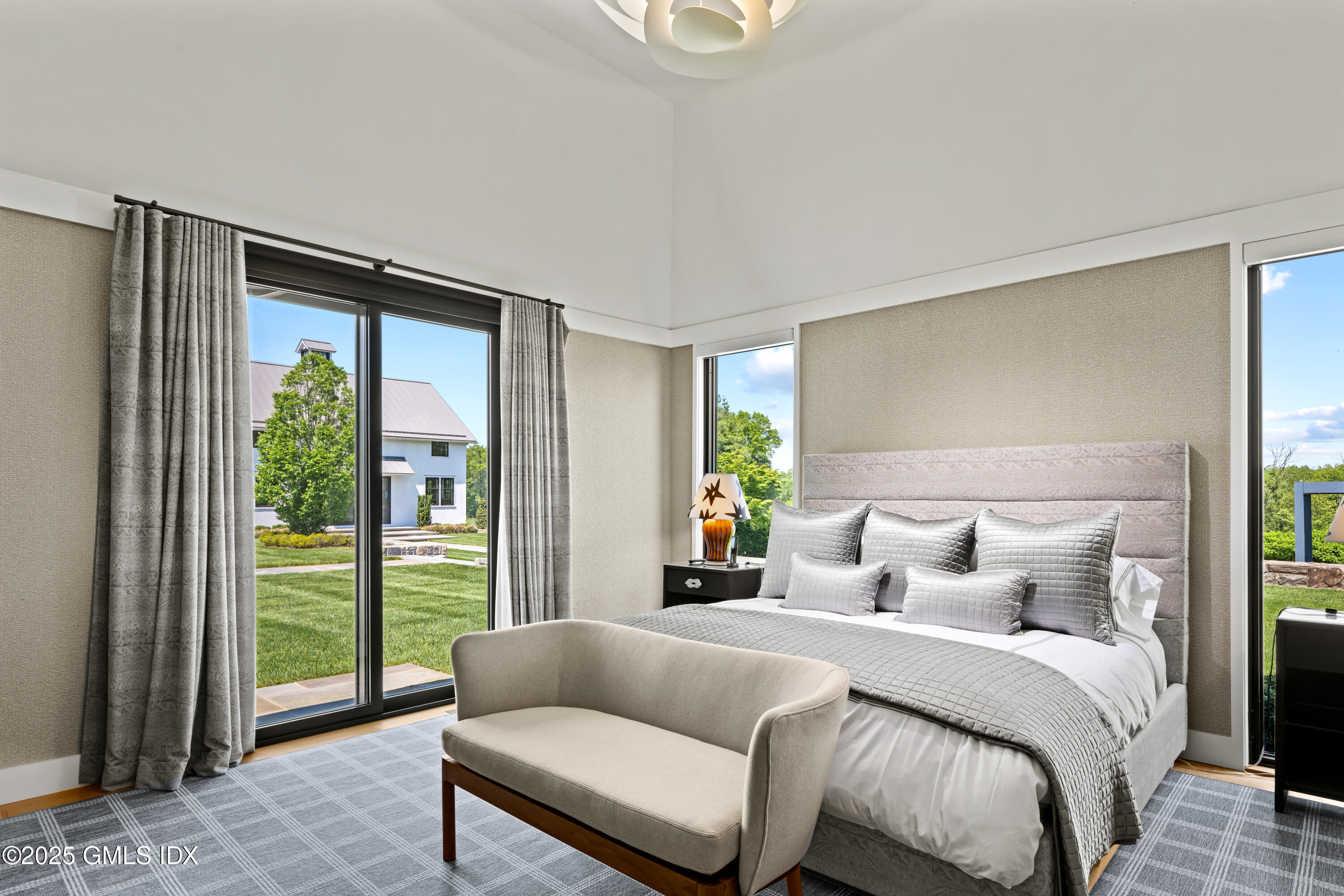 4800 Congress Street Fairfield, CT 06824 - Photo 24 of 37 a bedroom with a bed and a couch