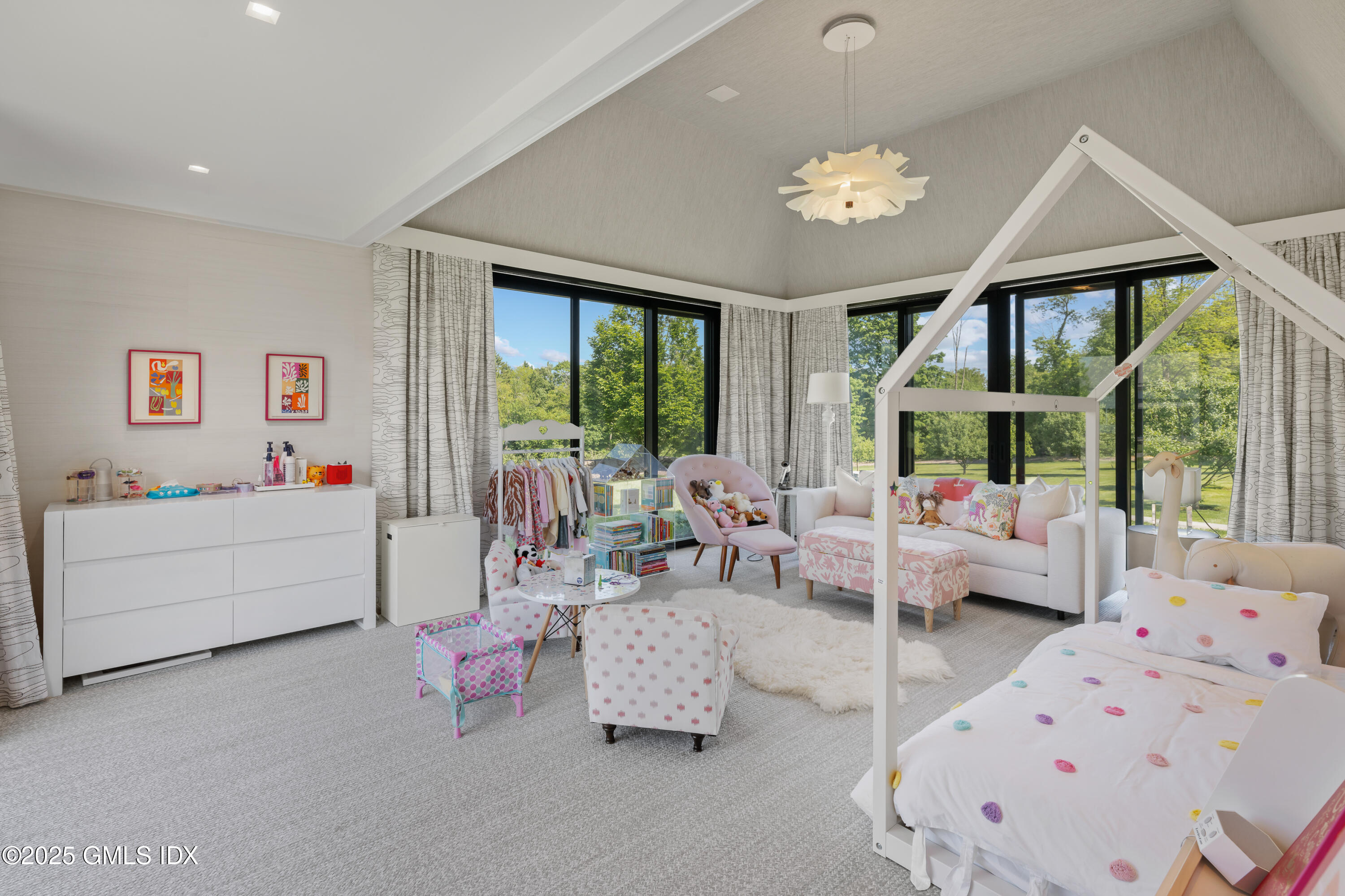 4800 Congress Street Fairfield, CT 06824 - Photo 25 of 37 a living room with furniture and large windows