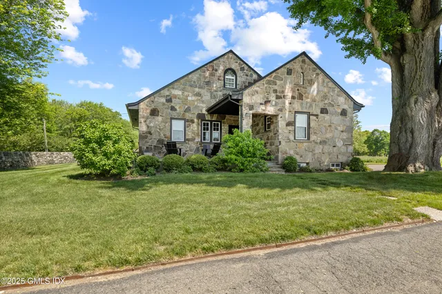 a backyard of a house with yard and green space