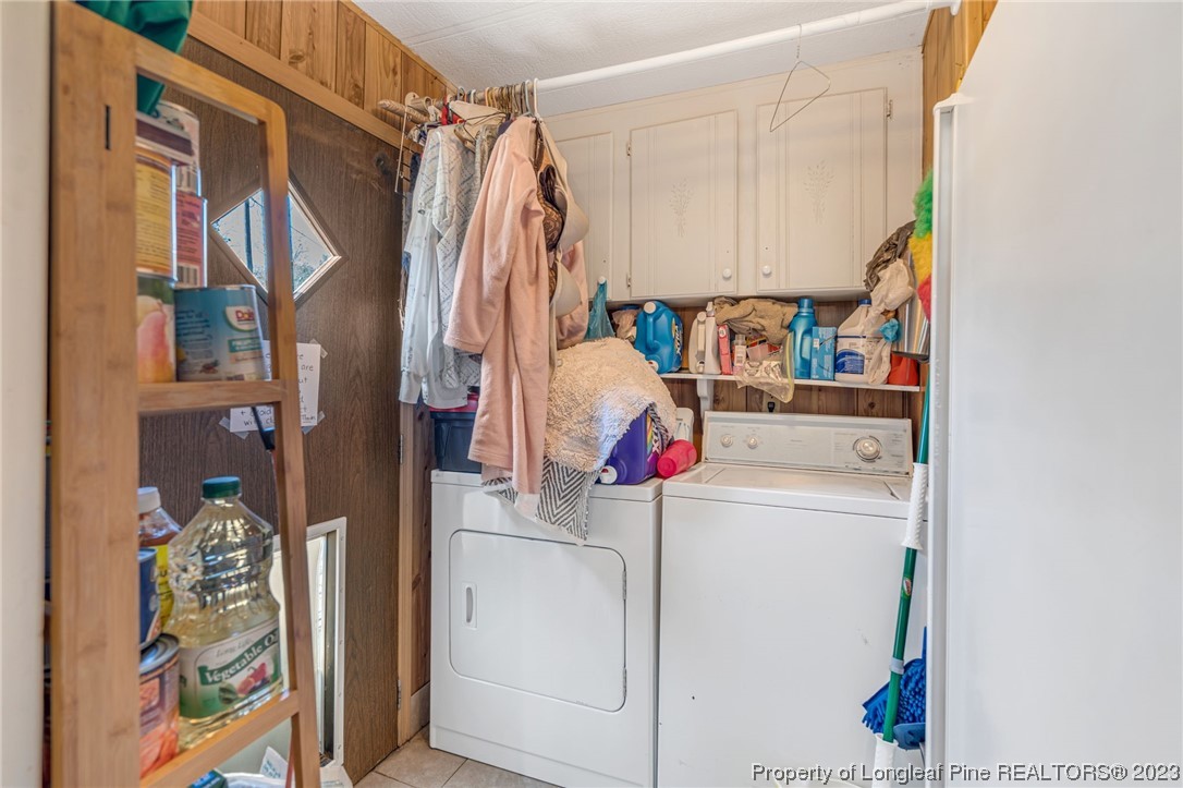 560 Moody Road Cameron, NC 28326 - Photo 11 of 29 a utility room with dryer and washer