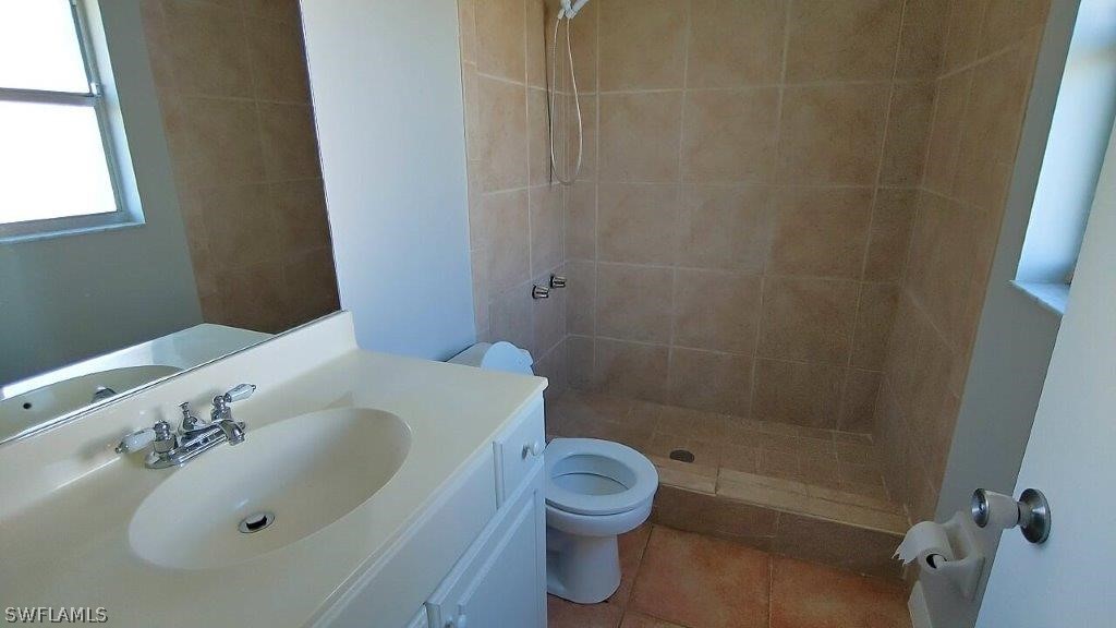 7409 Pebble Beach Road Fort Myers, FL 33967 - Photo 4 of 11 a bathroom with a sink and a toilet