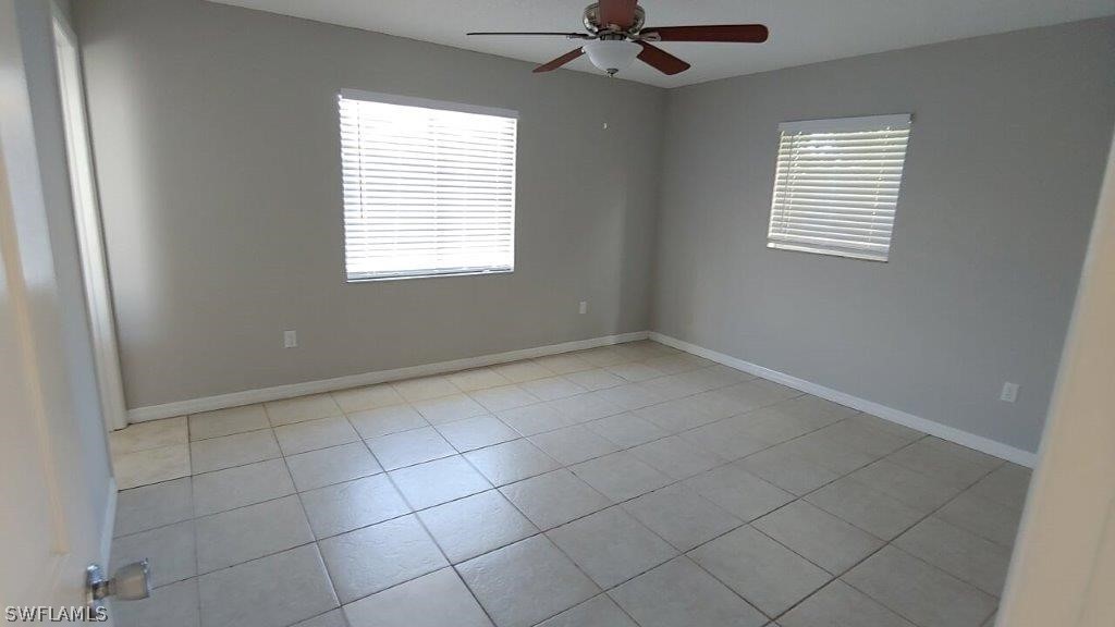 7409 Pebble Beach Road Fort Myers, FL 33967 - Photo 8 of 11 a view of an empty room with a window