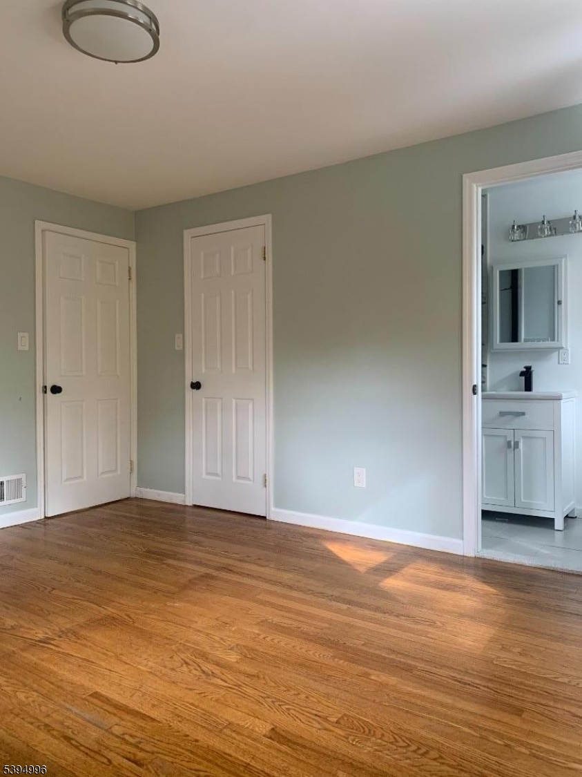 1072 Springfield Avenue New Providence, NJ 07974 - Photo 7 of 20 a view of an empty room and window