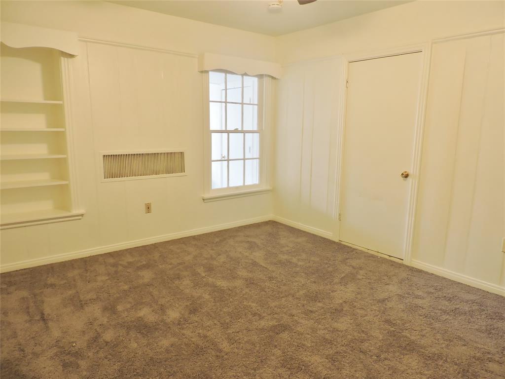3425 Westcliff Road South Fort Worth, TX 76109 - Photo 9 of 22 Unfurnished bedroom featuring carpet and baseboards