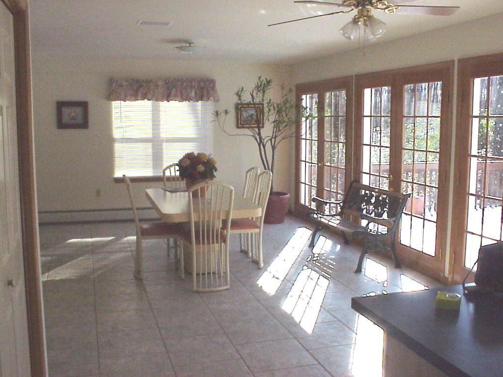 522 Devils Hole Road Cresco, PA 18326 - Photo 3 of 6 a view of a dining room with furniture window and outside view