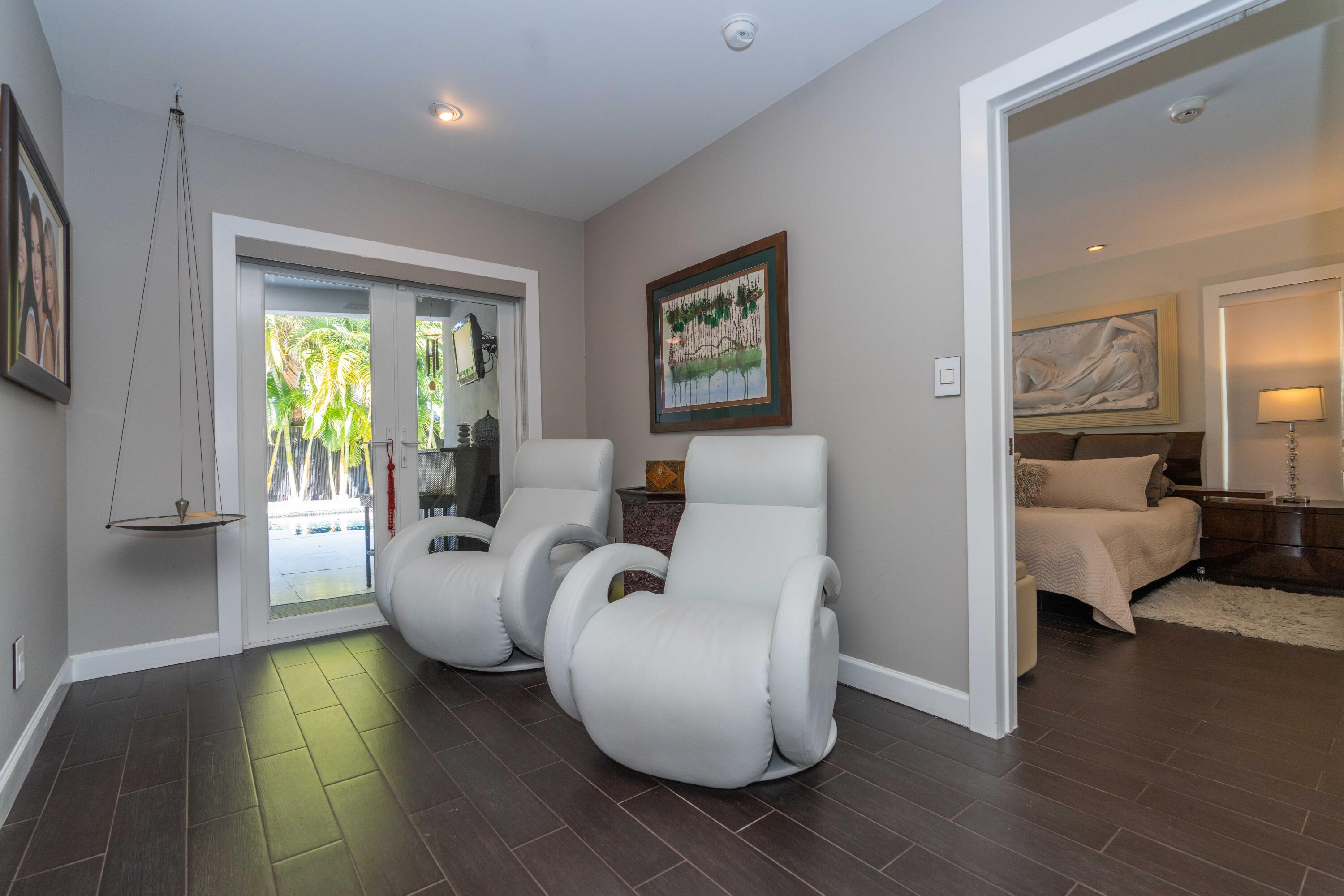855 Berkley Street Boca Raton, FL 33487 - Photo 14 of 31 a living room with furniture and a large window