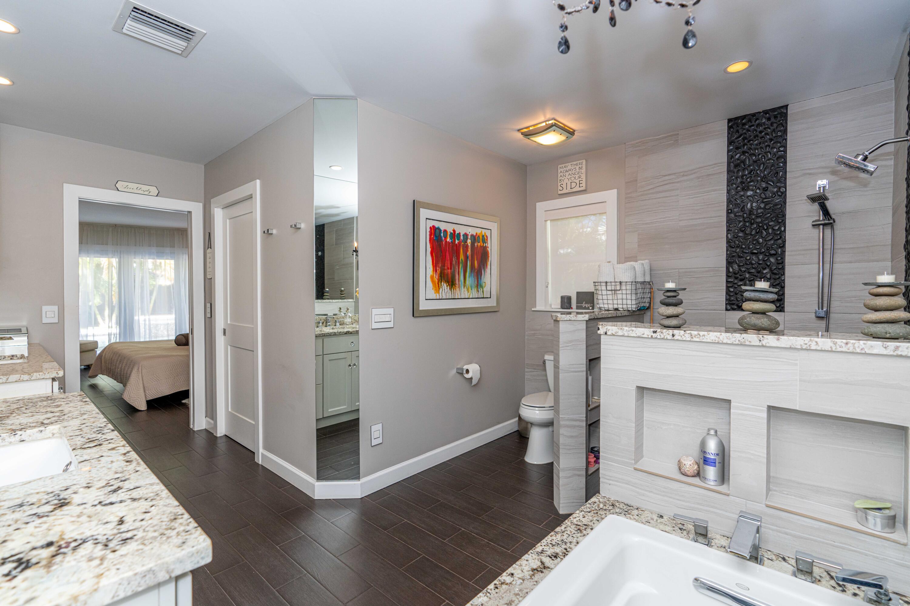 855 Berkley Street Boca Raton, FL 33487 - Photo 18 of 31 a living room with furniture and a fireplace