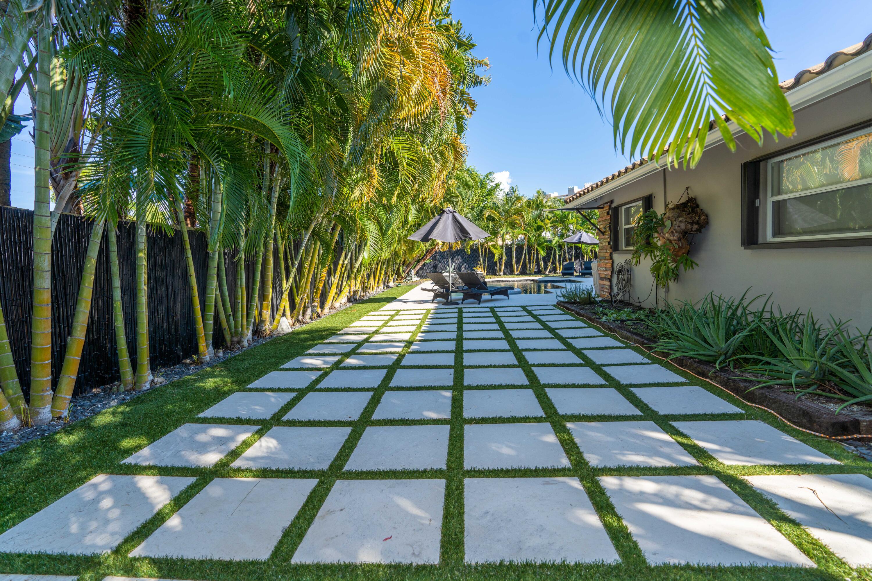 855 Berkley Street Boca Raton, FL 33487 - Photo 22 of 31 a picture of a yard