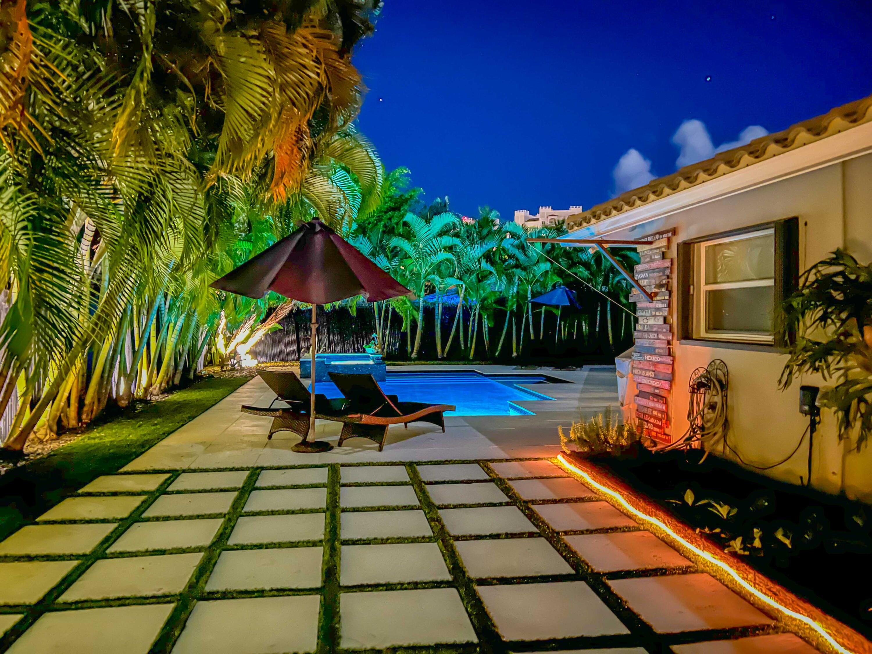 855 Berkley Street Boca Raton, FL 33487 - Photo 23 of 31 a view of a backyard with sitting area
