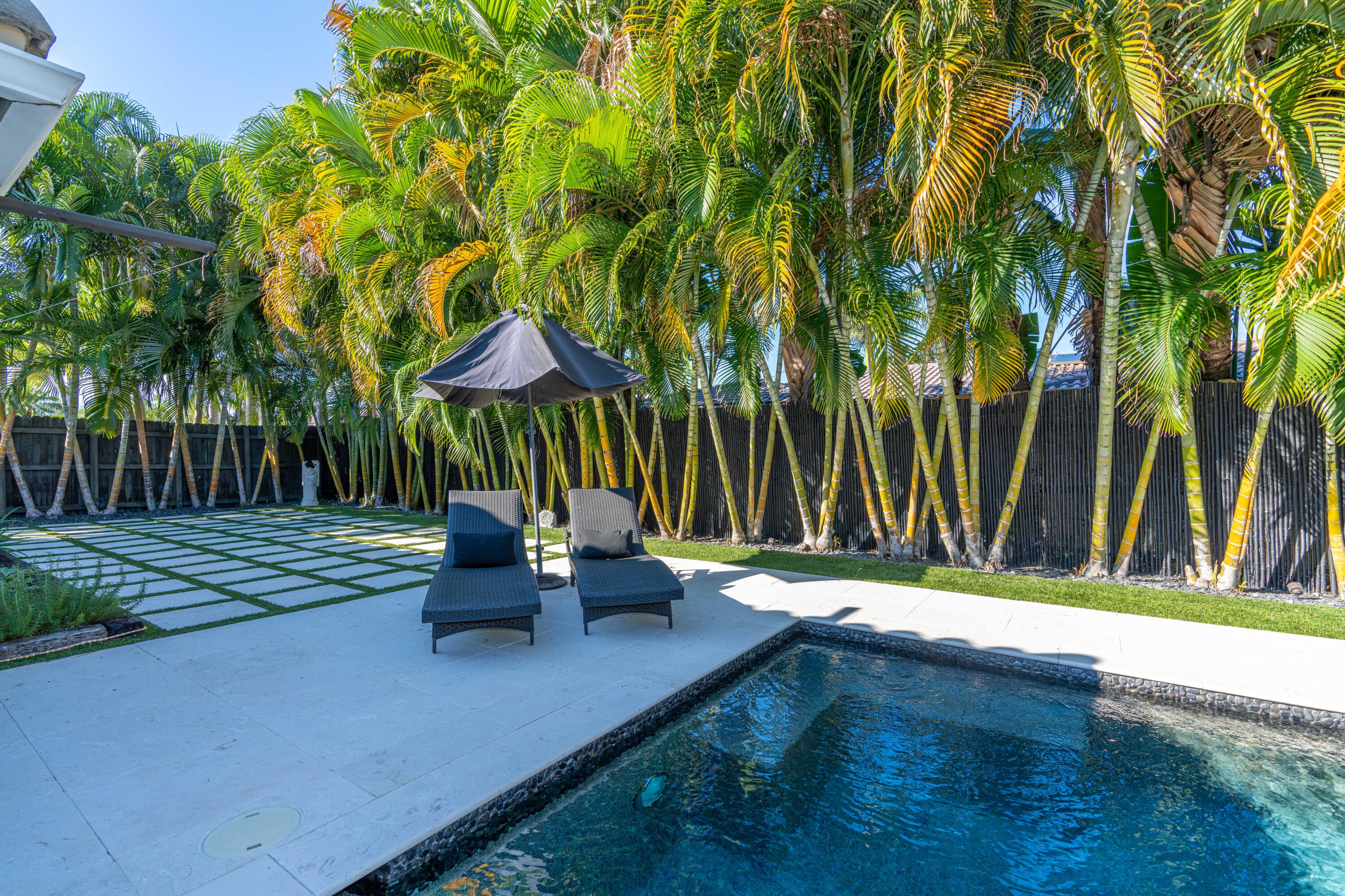 855 Berkley Street Boca Raton, FL 33487 - Photo 25 of 31 a garden view with a seating space