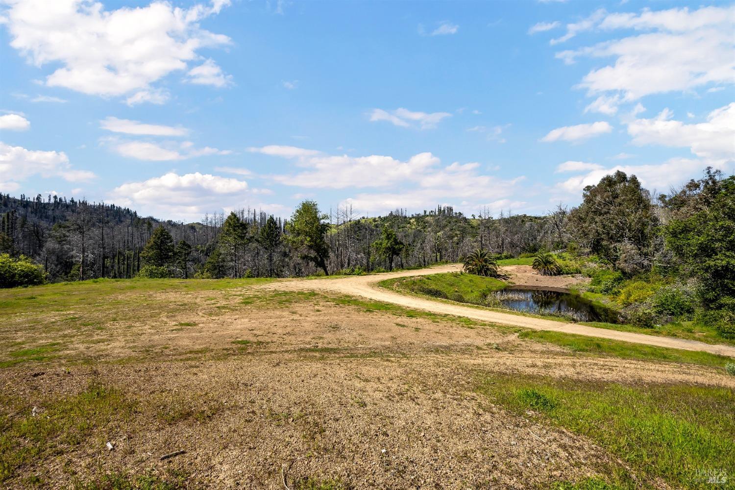 7777 Mill Creek Road Healdsburg, CA 95448 - Photo 1 of 18 a view of a lake view