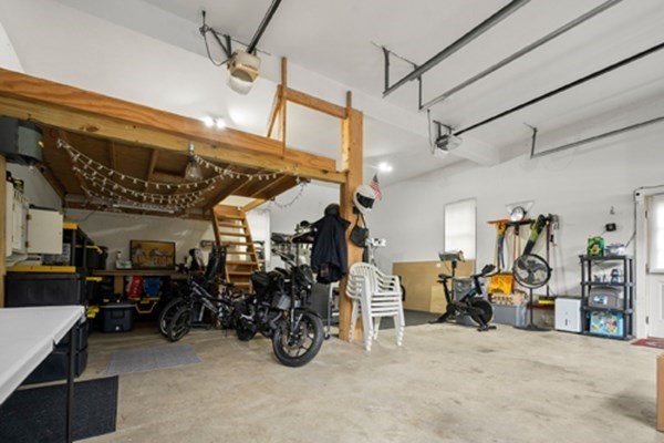 980 North Main Street Raynham, MA 02767 - Photo 23 of 29 a view of a garage with gym equipment