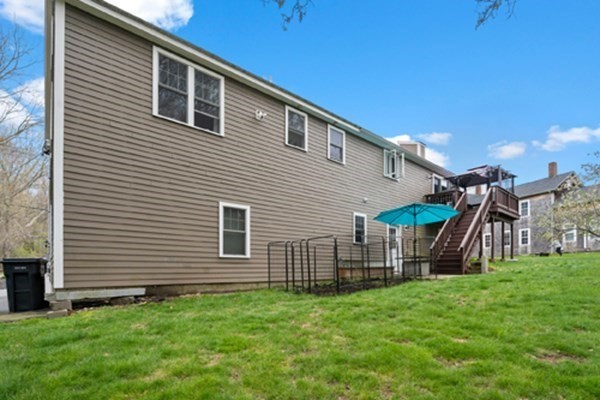 980 North Main Street Raynham, MA 02767 - Photo 29 of 29 a view of a house with a backyard