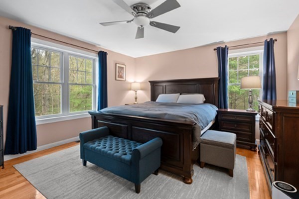 980 North Main Street Raynham, MA 02767 - Photo 8 of 29 a bedroom with a bed and a couch