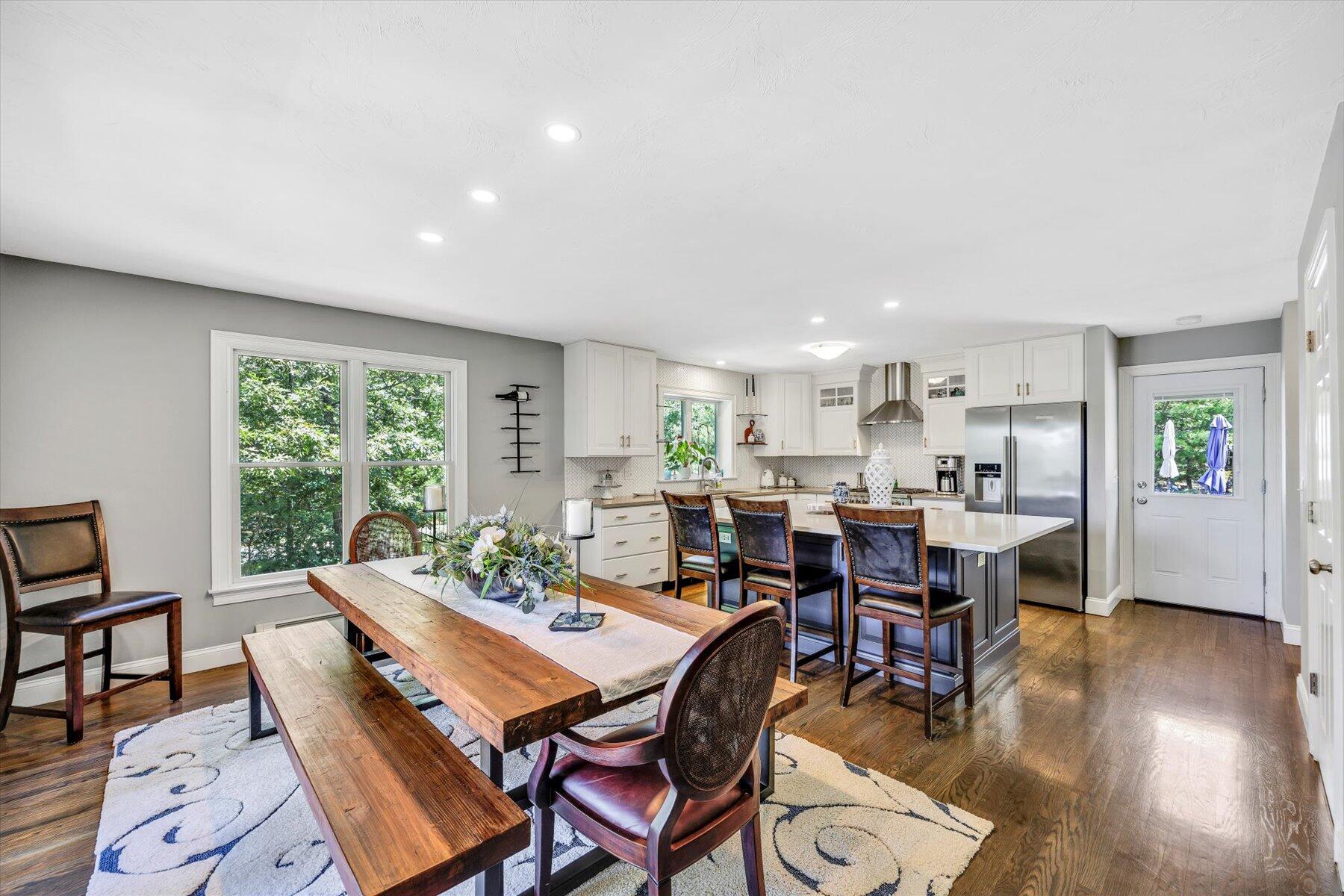 1 Ravens Nest Road Sandwich, MA 02563 - Photo 6 of 46 a view of a dining room with furniture window and wooden floor