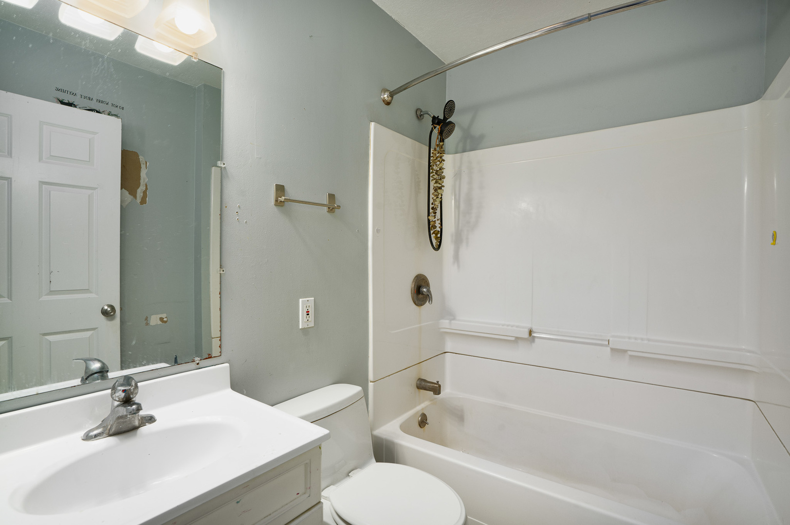 2697 River Road Kankakee, IL 60901 - Photo 19 of 60 a bathroom with a sink toilet and shower