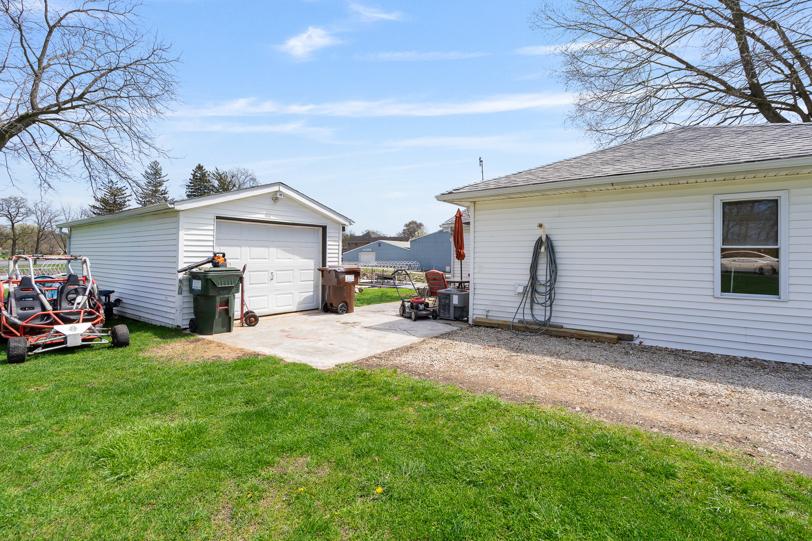 2697 River Road Kankakee, IL 60901 - Photo 43 of 60 a view of a house with backyard and sitting area