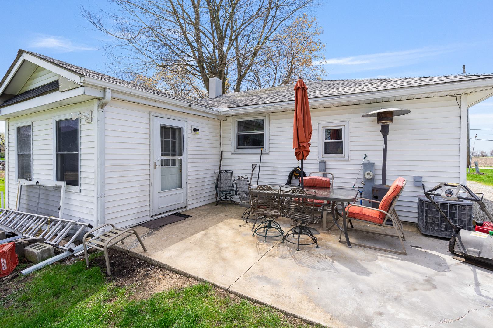 2697 River Road Kankakee, IL 60901 - Photo 50 of 60 a backyard of a house with outdoor seating