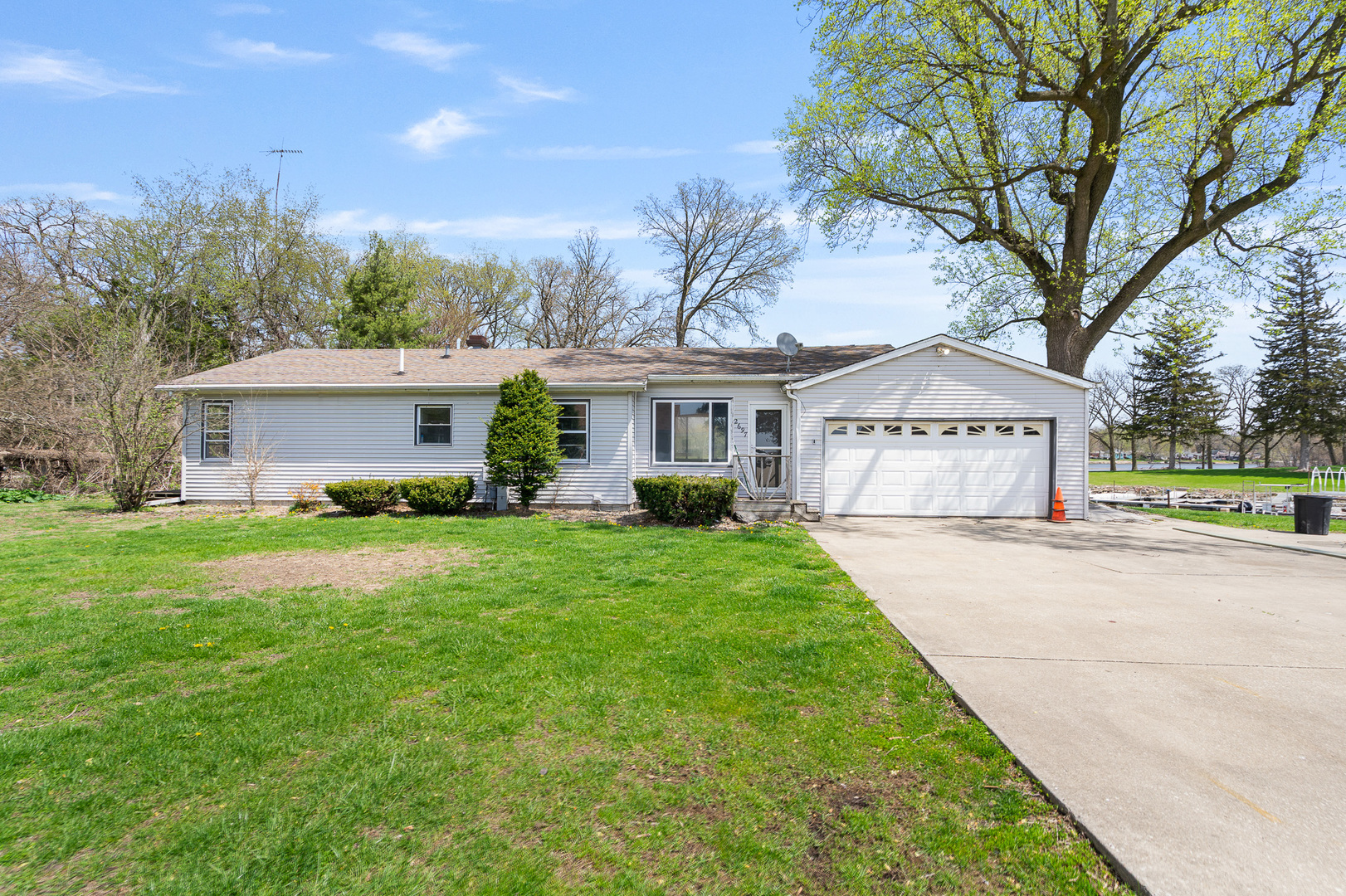 2697 River Road Kankakee, IL 60901 - Photo 5 of 60 a view of a house with garden and trees