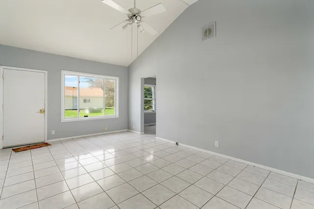 a view of a kitchen with a stove cabinets and a kitchen area