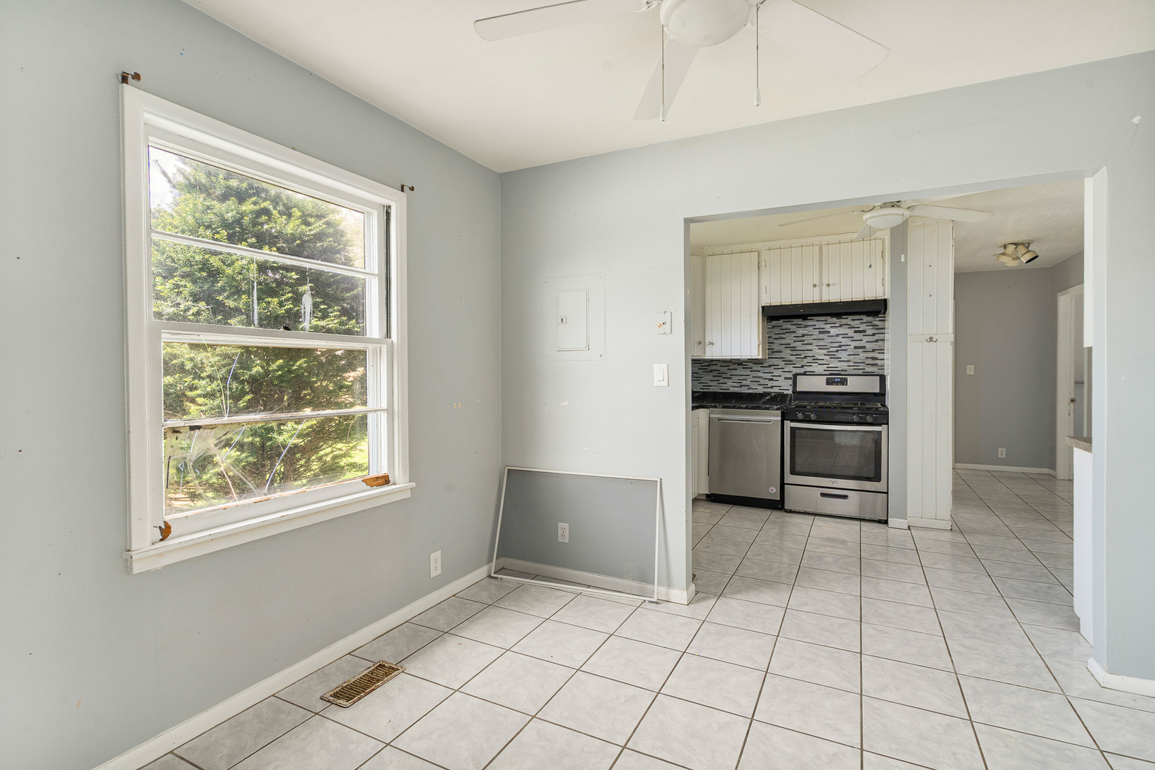 2697 River Road Kankakee, IL 60901 - Photo 10 of 60 a view of a kitchen with a stove cabinets and a kitchen area